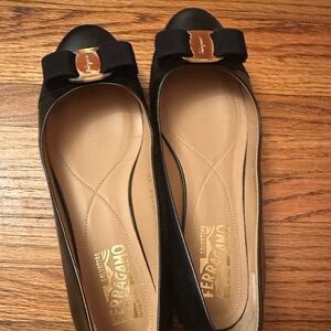 Salvatore Ferragamo Black Flats with Gold Accents